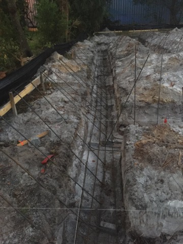 Project management — concrete foundation with rebar